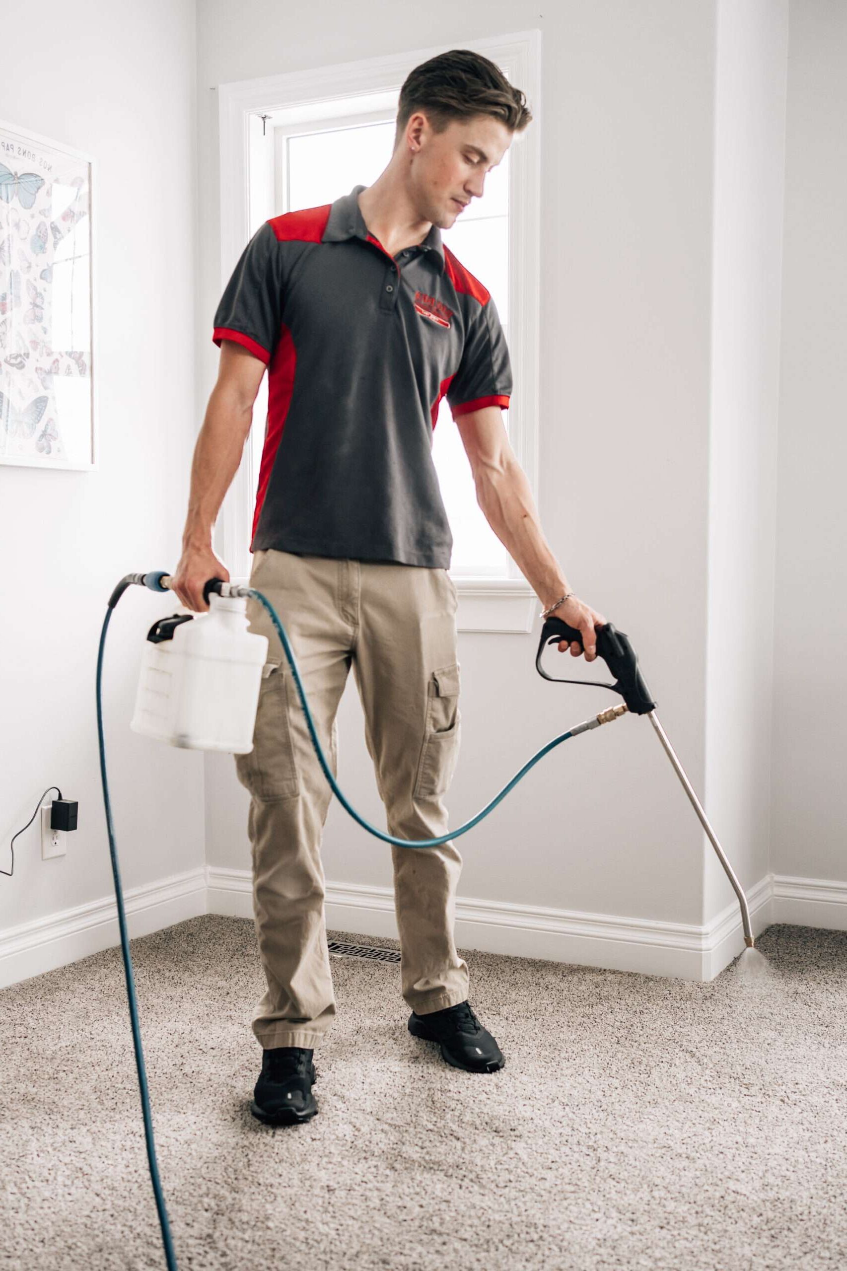 Big Ben Cleaning technician using advanced equipment to deep clean a carpet in a Calgary home.