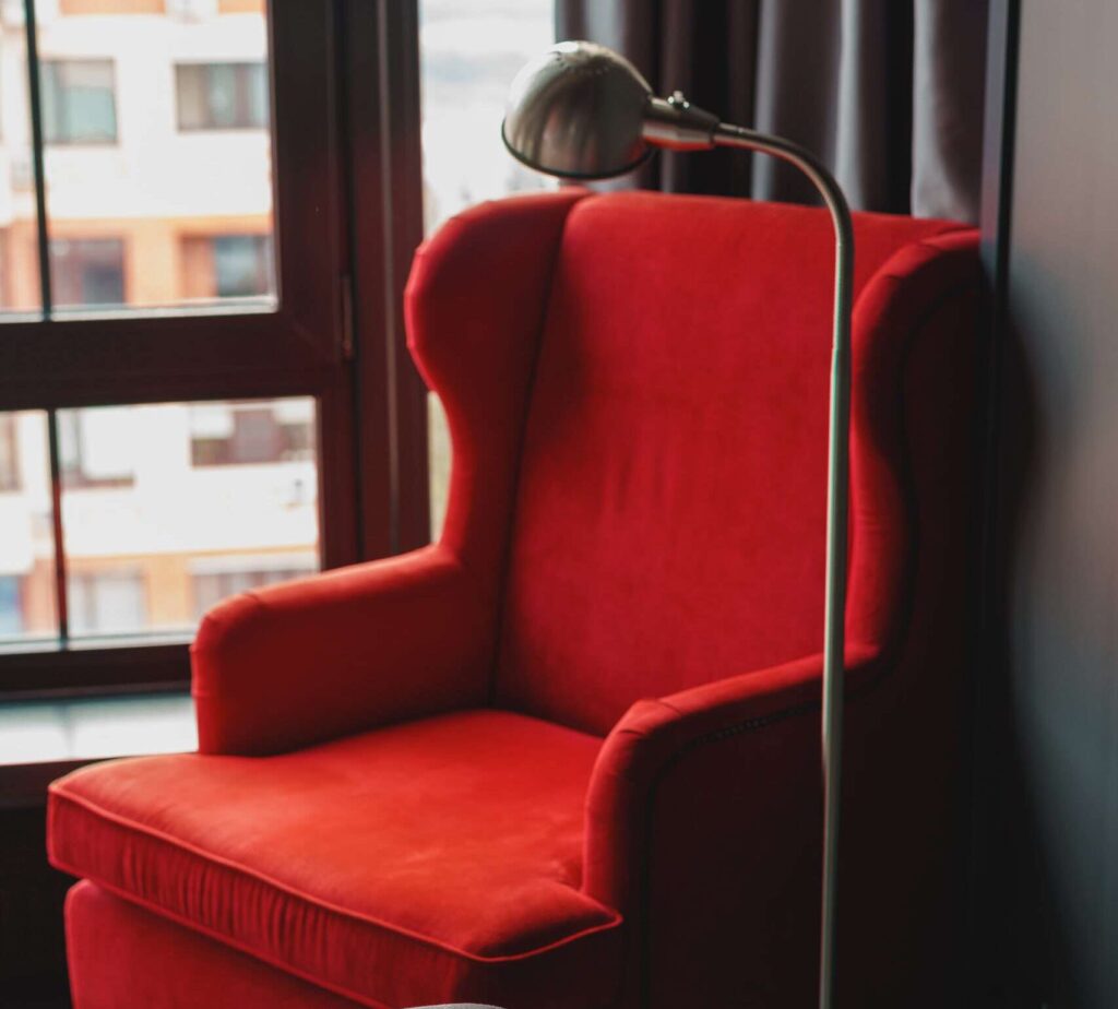 Freshly cleaned upholstered chair looking like new after a professional upholstery cleaning service.
